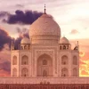 Online De Taj Mahal bij zonsondergang fotobehang Architectuur