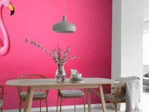 Outlet Flamingo van kunstof met een roze achtergrond fotobehang Tienerkamer | Dieren