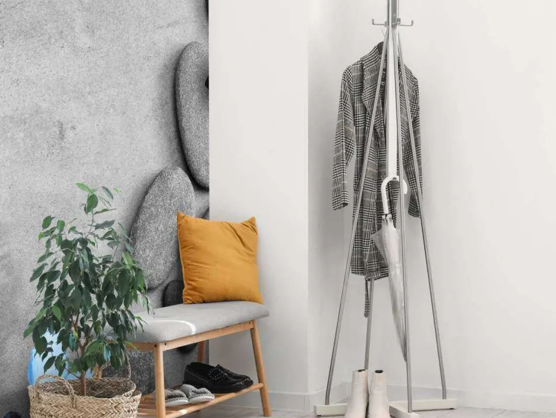 grijze_stenen_met_een_bla_5.webp Clearance Grijze stenen met een blauwe vlinder en bloemen fotobehang Oppervlakten | Bloemen