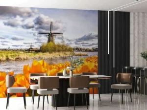 Online Hollandse molen met oranje tulpen op de voorgrond fotobehang Steden | Architectuur