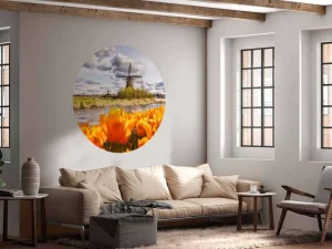 Online Hollandse molen met oranje tulpen op de voorgrond fotobehang Steden | Architectuur