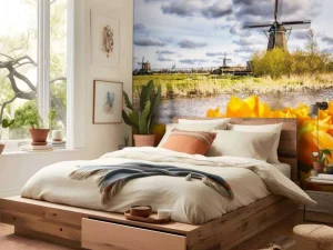 Online Hollandse molen met oranje tulpen op de voorgrond fotobehang Steden | Architectuur