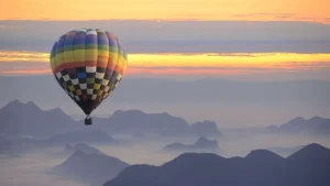 Clearance Luchtballon bij zonsondergang fotobehang Transport