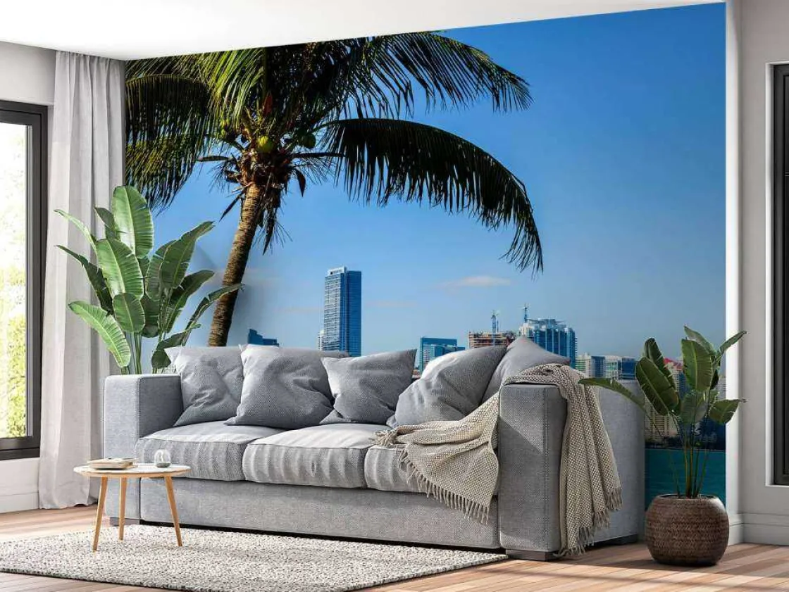 miami_skyline_met_een_pal_2.webp New Miami skyline met een palmboom op de voorgrond fotobehang Architectuur