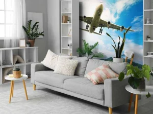 Best Passagiersvliegtuig boven een tropische zee fotobehang Tienerkamer | Transport
