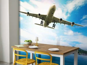 Best Passagiersvliegtuig boven een tropische zee fotobehang Tienerkamer | Transport