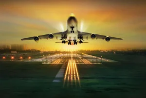 Discount Passagiersvliegtuig stijgt op bij zonsondergang fotobehang Tienerkamer | Transport