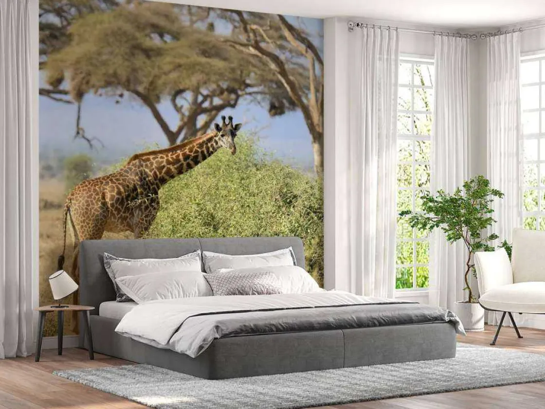 schattige_giraffe_tussen__1.webp Best Schattige Giraffe tussen struiken fotobehang Dieren | Bloemen