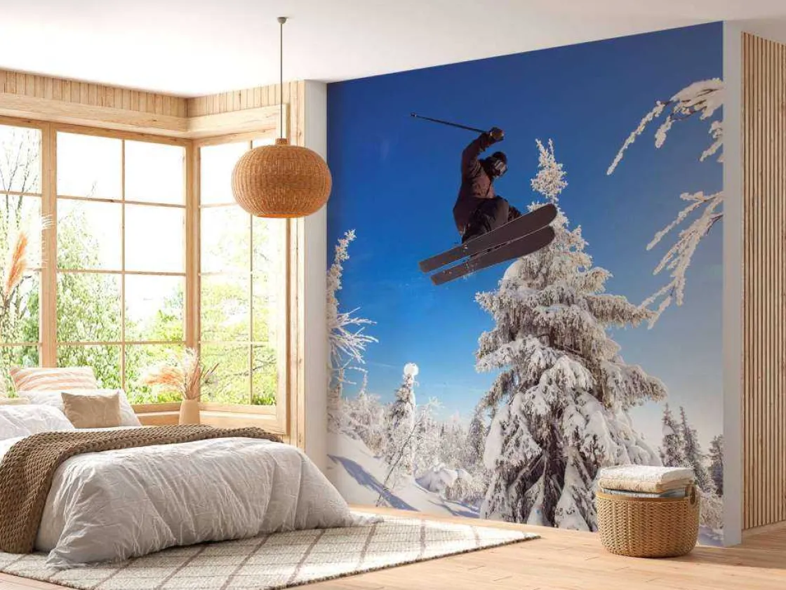 skir_maakt_een_hoge_spron_1.webp Sale Skiër maakt een hoge sprong fotobehang Tienerkamer | Sport