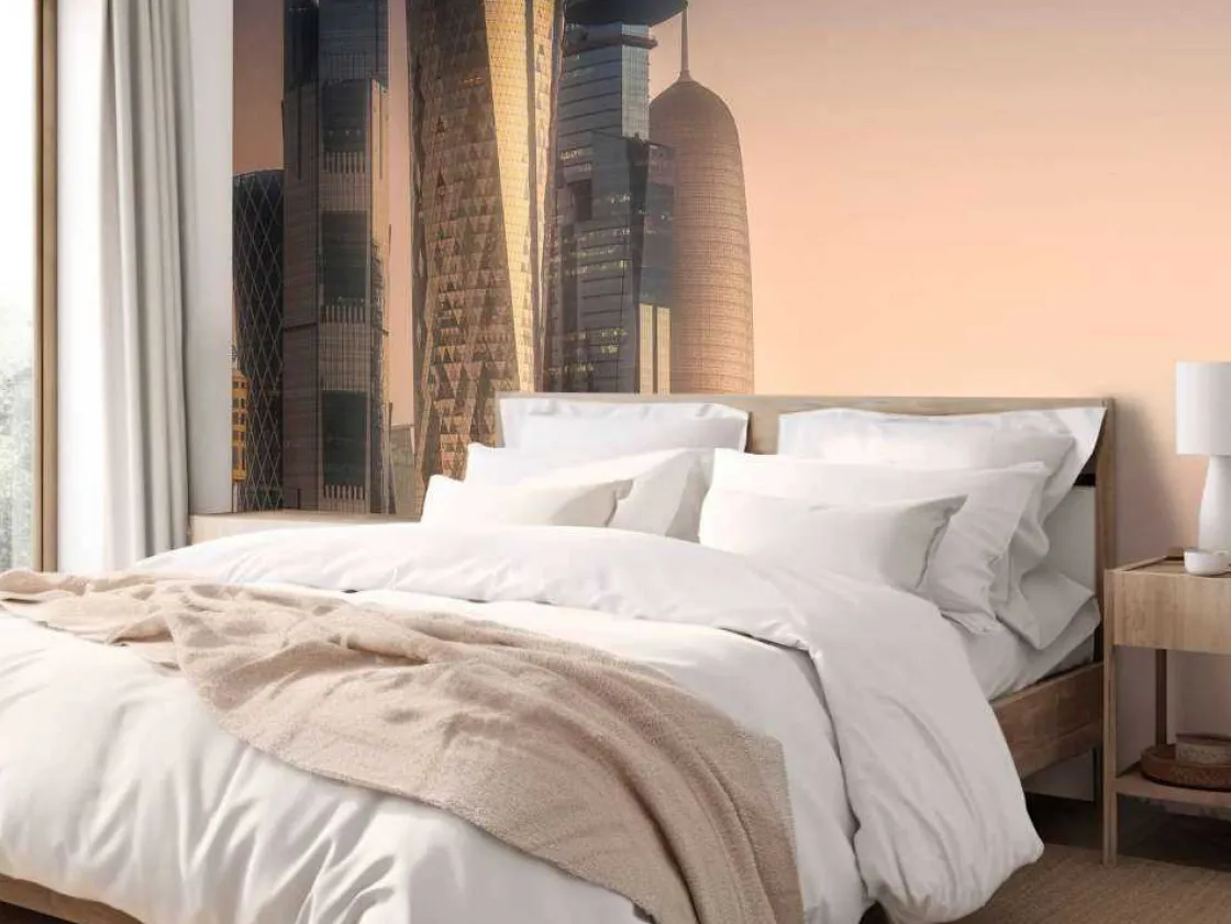skyline_van_doha_in_de_av_1.webp Discount Skyline van Doha in de avond fotobehang Architectuur