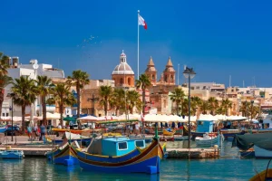Outlet Traditionele boten in de haven van Marsaxlokk, Malta fotobehang Transport | Architectuur