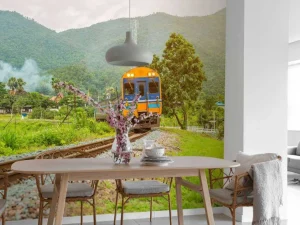 Fashion Trein door een dorpje in Thailand fotobehang Transport