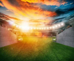 Online Voetbalstadion ingang bij zonsondergang fotobehang Tienerkamer | Kinderkamer