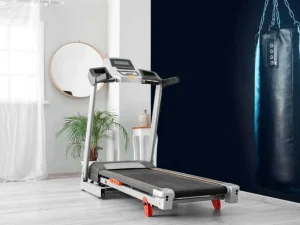 Discount Zwarte bokszak met een blauwe achtergrond fotobehang Sport